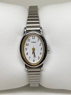Timex women’s watch silver tone oval case 18mm quartz analog size 6.5” running